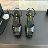 HIGH HEEL PLATFORM SANDALS IN BLACK CALFSKIN